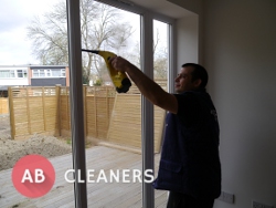 Expert AB Cleaner Sanitising a Window